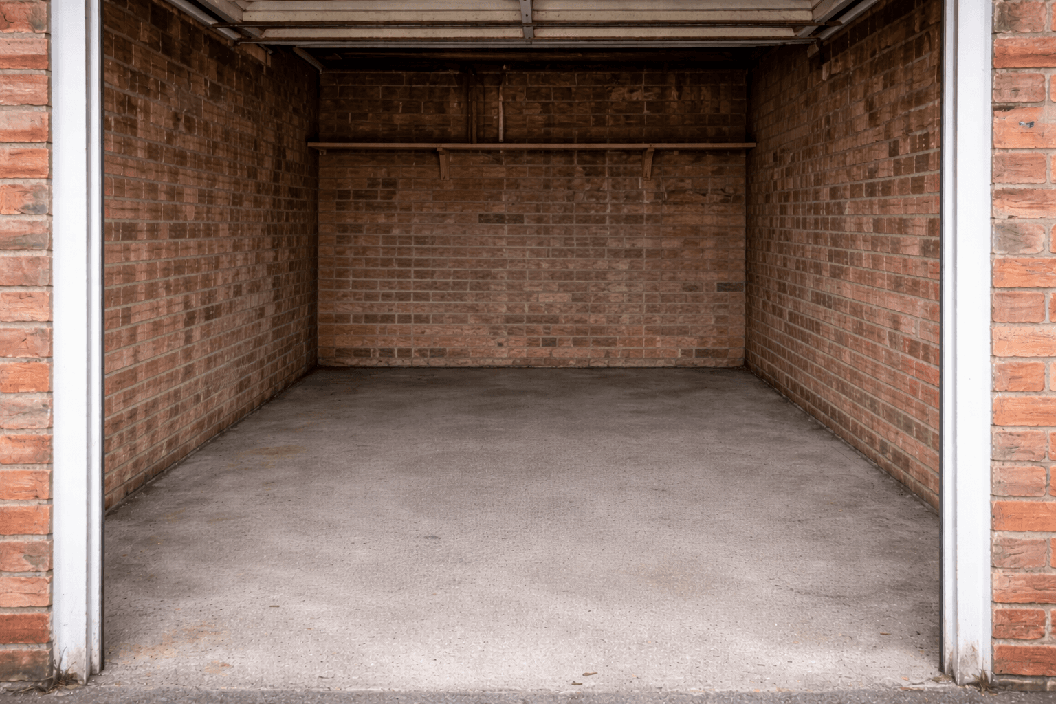 Same garage completely empty and swept clean